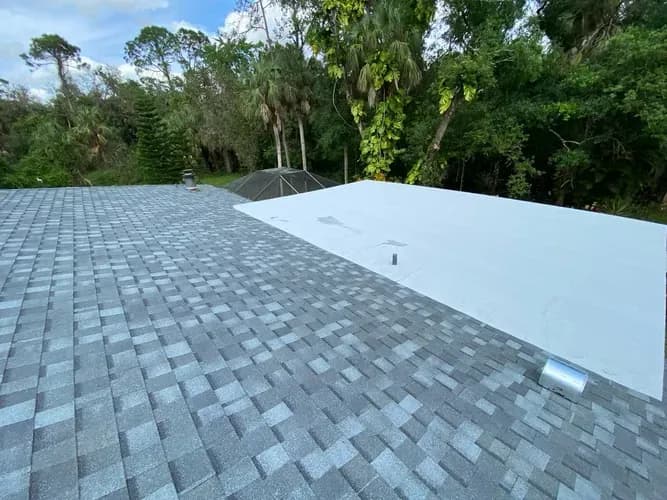 Vreeland roofing service, type shingle color Coastal Granite.