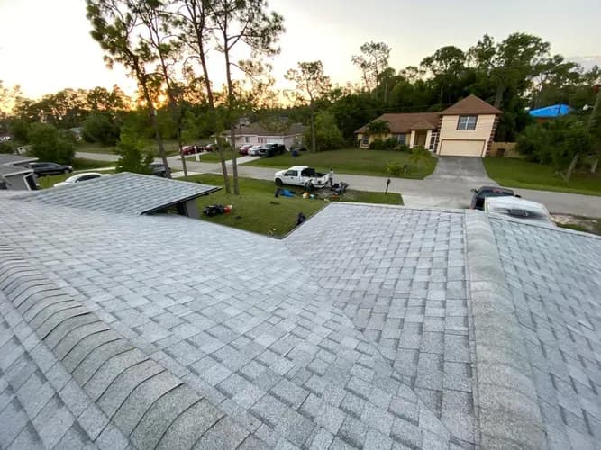 Vreeland roofing service, type shingle color Oyster Shell.