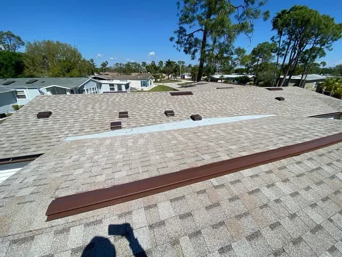 Vreeland roofing service, type shingle color Tan Mist.
