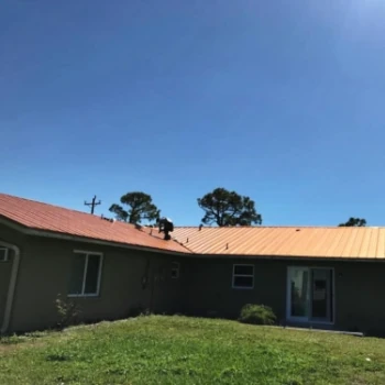 gold color metal roof newly renovated by vreeland roofing