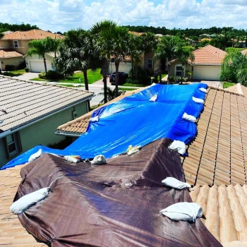 Home with canvas tile roof by Vreeland Roofing after hurricane